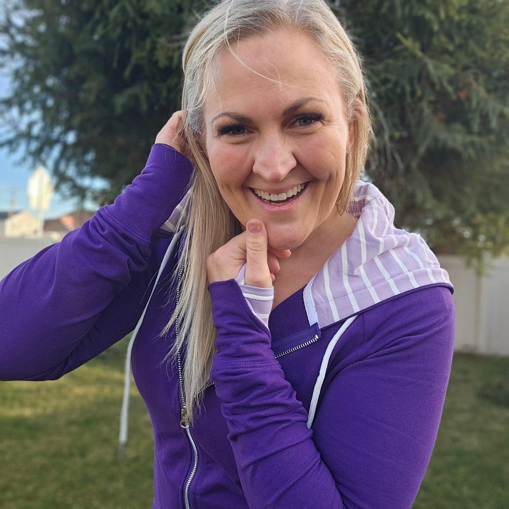 Holly Full Zip, purple body with lavender and white striped accent hood and thumbholes- Shop7degrees