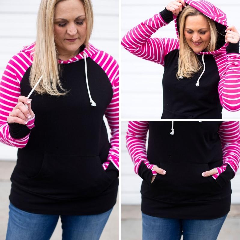 Gallery detail view Roxy Womens Pullover, black body with pink and white stripe long sleeve with thumbholes, shown in Large - Shop7degrees