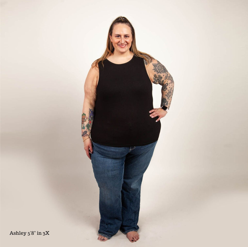 A woman wearing a black high-neck ribbed tank top. shown in size 3XL