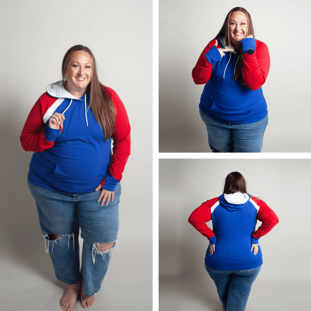 Woman wearing a blue and red hoodie with white accents, kangaroo pocket, blue sleeve watch cuffs, and red accent thumbholes. shown in size 3XL