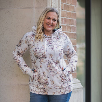 Ellie Floral Womens Pullover Video with Green Stripe Accents, longer body, longer sleeves with comfortable thumbholes, floral womens pullover, size inclusive, plus size womens, shown in size Large- 7Degrees
