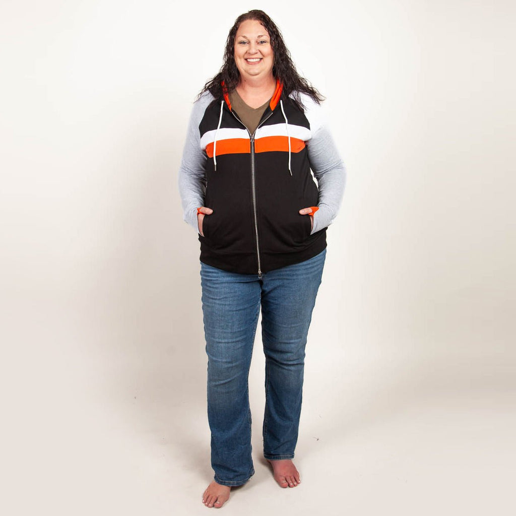 ridgevue-full-zip-Women's fashion hoodie color block Black body with Dark orange and white stripe accented sleeves with heather grey and dark orange in the thumbholes and hood. Features double zipper for curvier fit, feminine tailored and hood shown in 2XL women