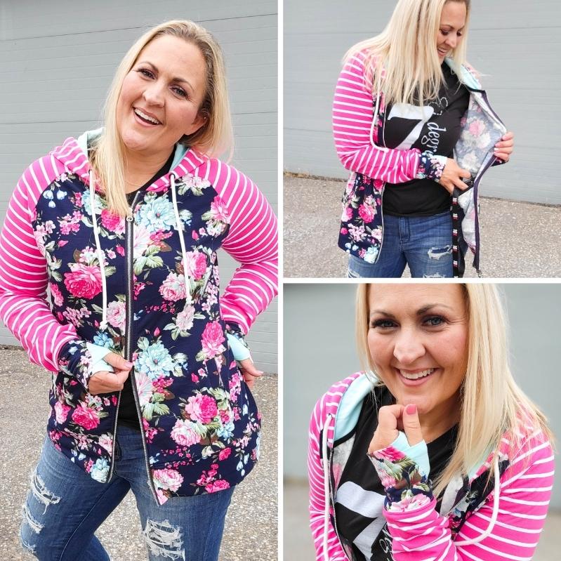 Gallery view Isabel Blue Floral Woman's Full zip Hoodie pink and white stripe sleeve navy floral details, double zipper, inside pocket and accent thumbholes, long sleeve womens hoodie - 7degrees