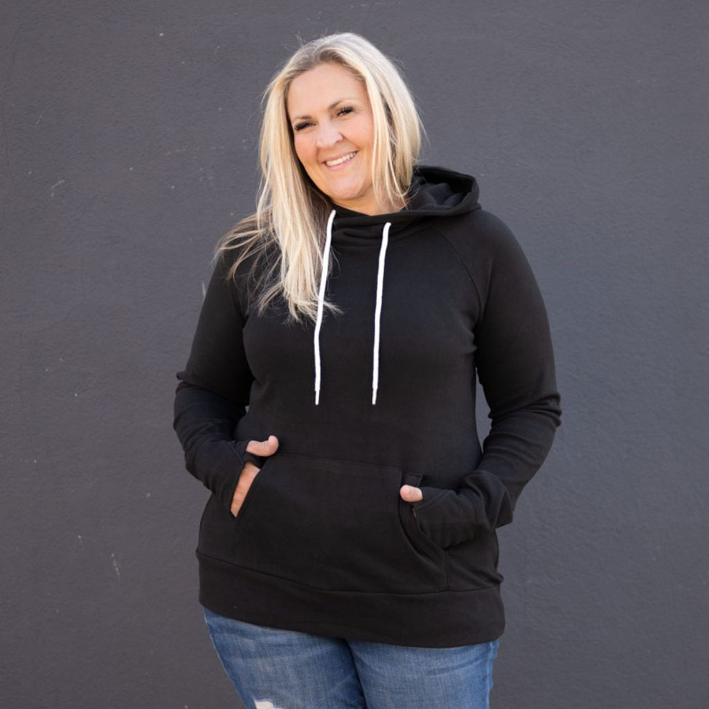 Lux Fleece Black Pullover Woman Hoodie, kangaroo pocket, longer body, longer sleeves with comfortable thumbholes, shown in size XL- Shop7degrees