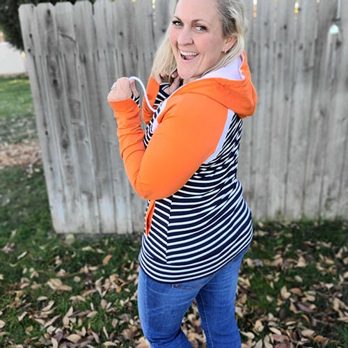 True Blue Full Zip Hoodie, dark blue and white striped body with orange sleeve and accents, womens full zip hoodie, back view, shown in size large - Shop7degrees