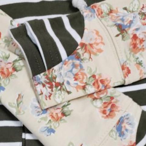 Tuscany Full zip Womens hoodie, olive striped body with floral sleves, longer body, longer sleeves with thumbholes detail view - Shop7degrees