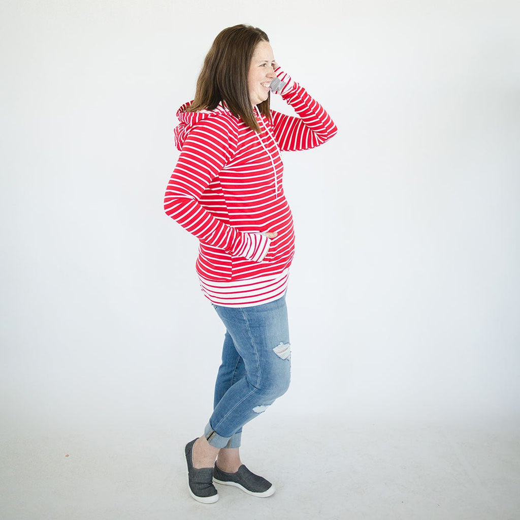 Twisted Peppermint Pullover, red and white striped womens top, womens long sleeve pullover, long sleeve with thumbholes, side view shown in size medium - Shop7degrees